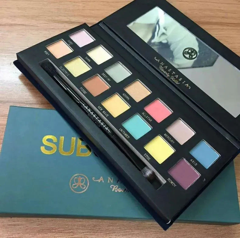 Front view of 14-color eyeshadow palette showing chocolate and peach shade arrangement