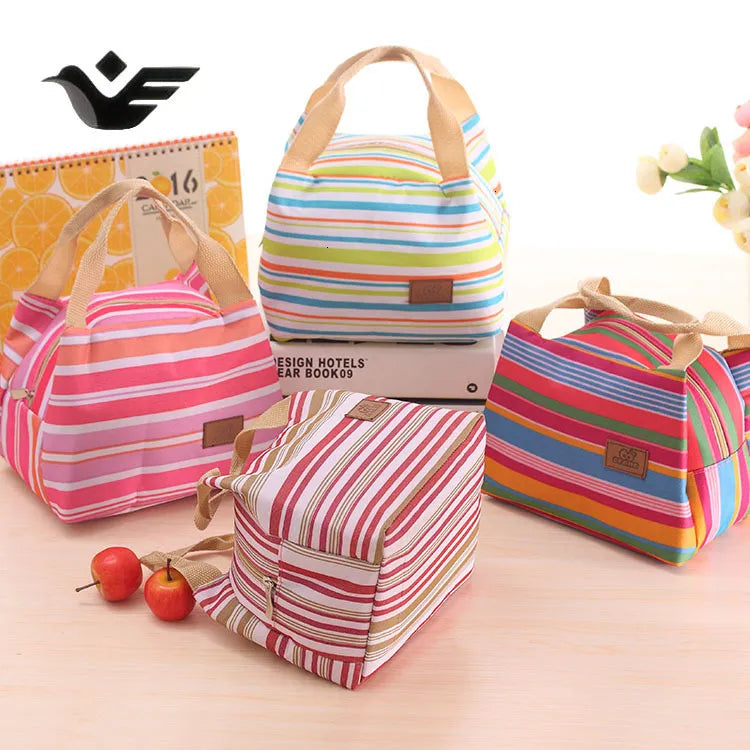 Lunch bag in use on a table with food items inside