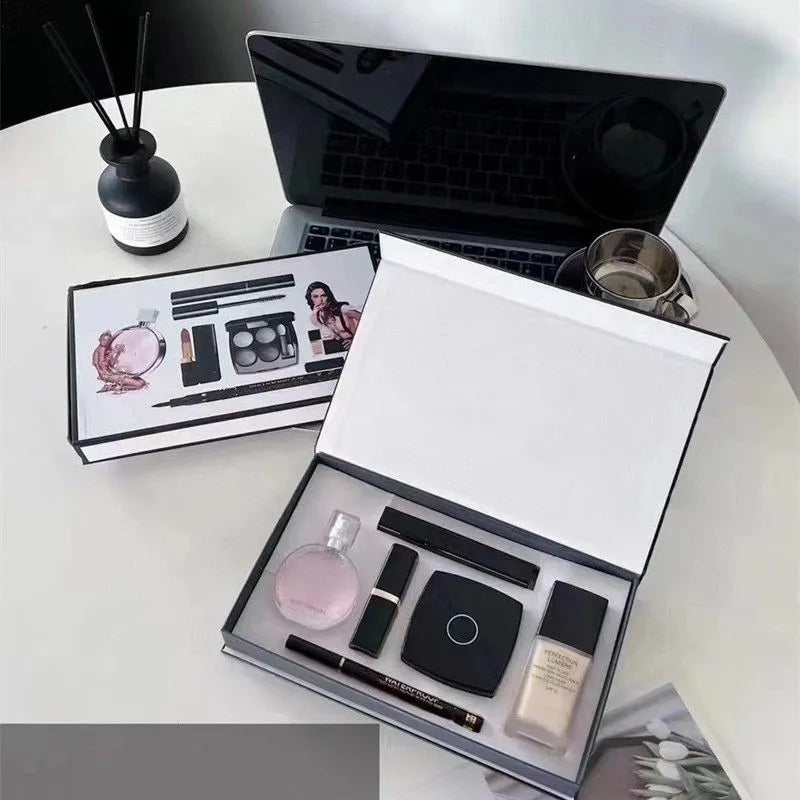 Makeup set with perfume and cosmetics displayed in an open box