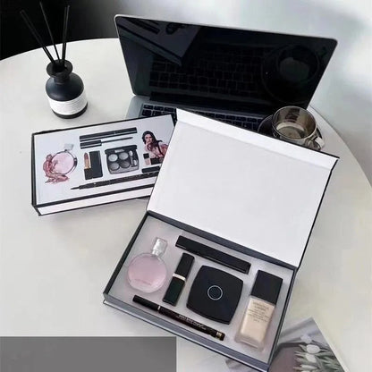 Makeup set with perfume and cosmetics displayed in an open box