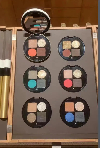 Swatch demonstration of four eyeshadow colors on skin