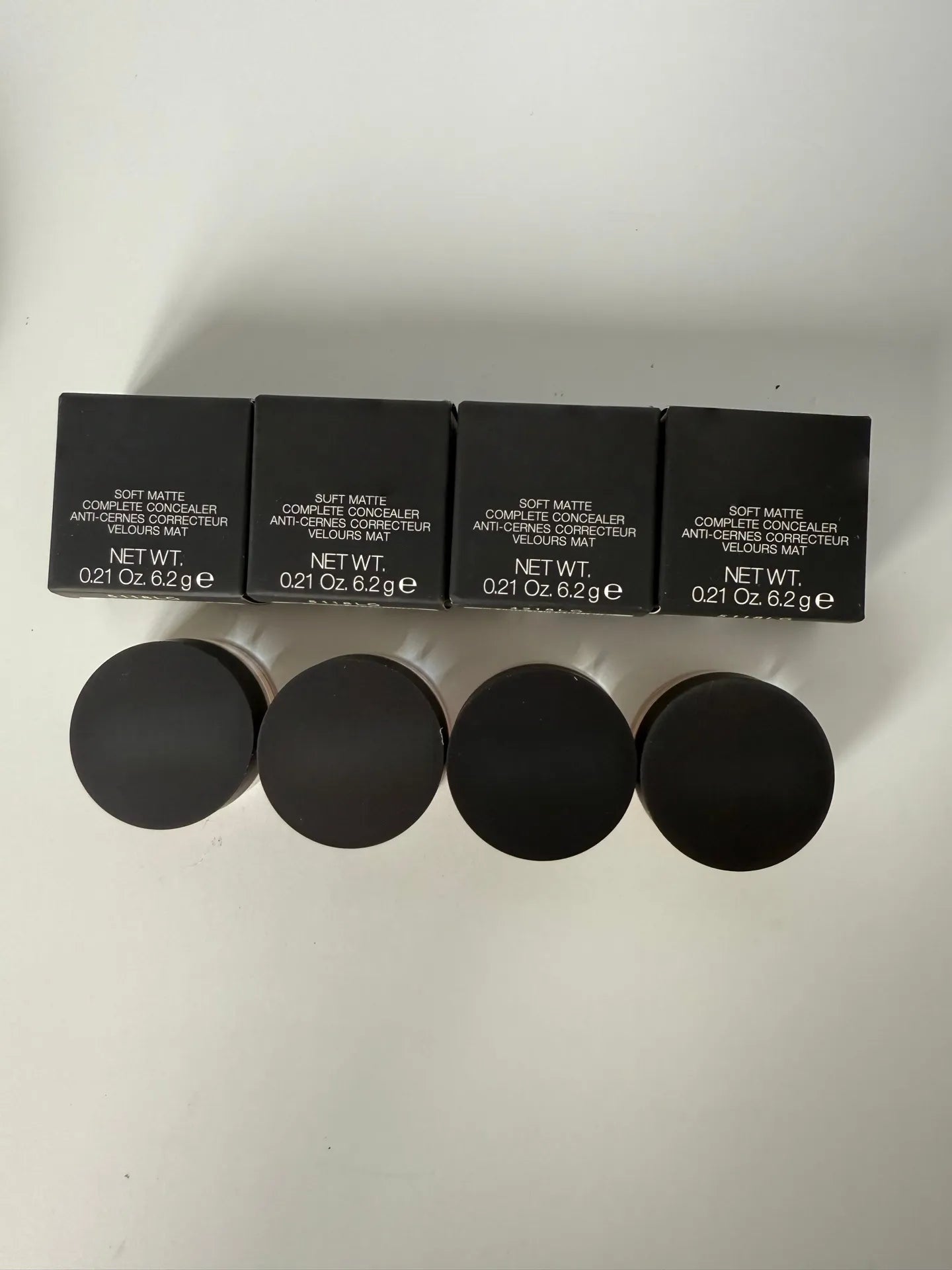 Matte finish concealer cream in a compact container