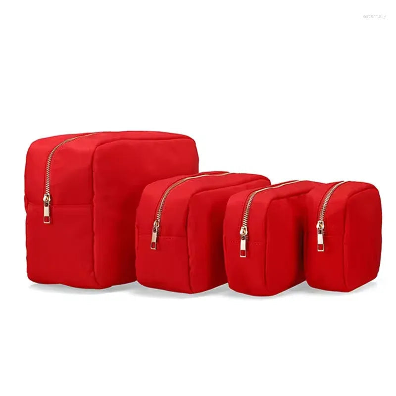 Waterproof nylon cosmetic bag with zipper closure in closed position