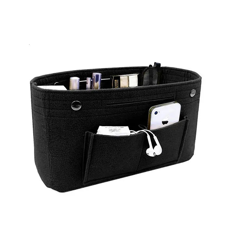 Compact cosmetic organizer fitting inside a handbag for travel