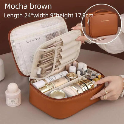 Makeup bag showing multiple compartments for brush and cosmetic organization