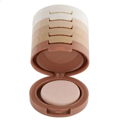 Five shades of loose setting powder in individual compartments