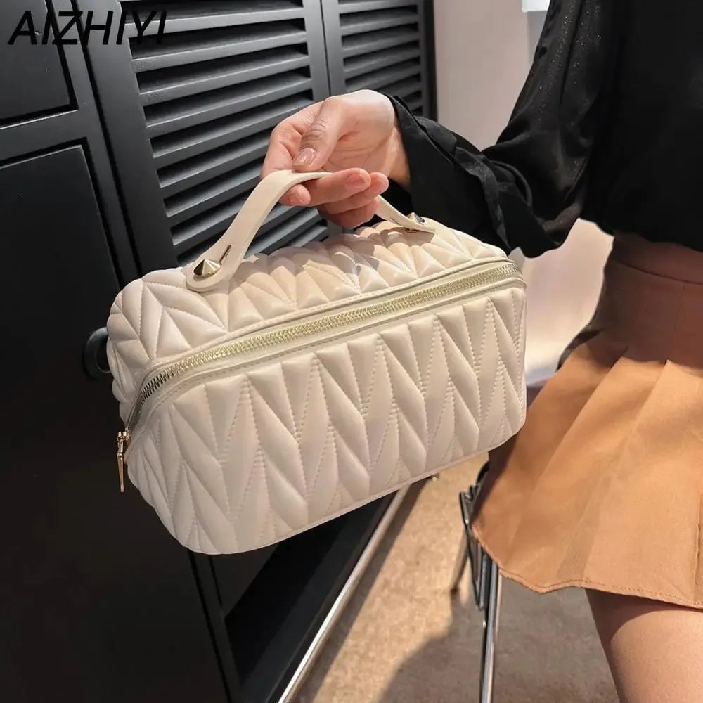 Interior view showing multiple compartments of the cosmetic bag