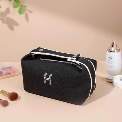 Handheld makeup bag in blue color with Japanese-style aesthetic