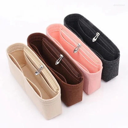 Beige felt bag organizer displayed open to show internal storage pockets