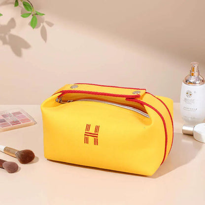 Canvas travel makeup bag in black color with waterproof design