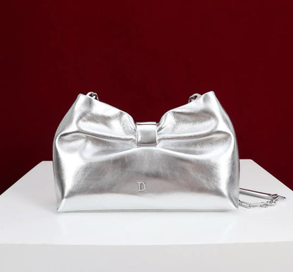 Interior view displaying organized compartments of women's handbag