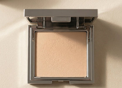 Poudre fixante pressée avec applicateur
