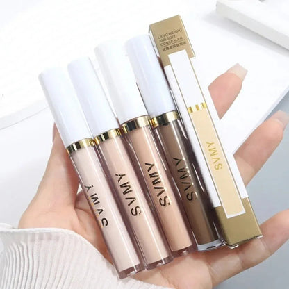 Cream concealer stick in multiple shade options displayed on a neutral background