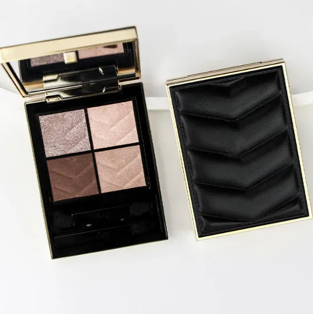 Close-up view of the matte eyeshadow palette showing gradient shades
