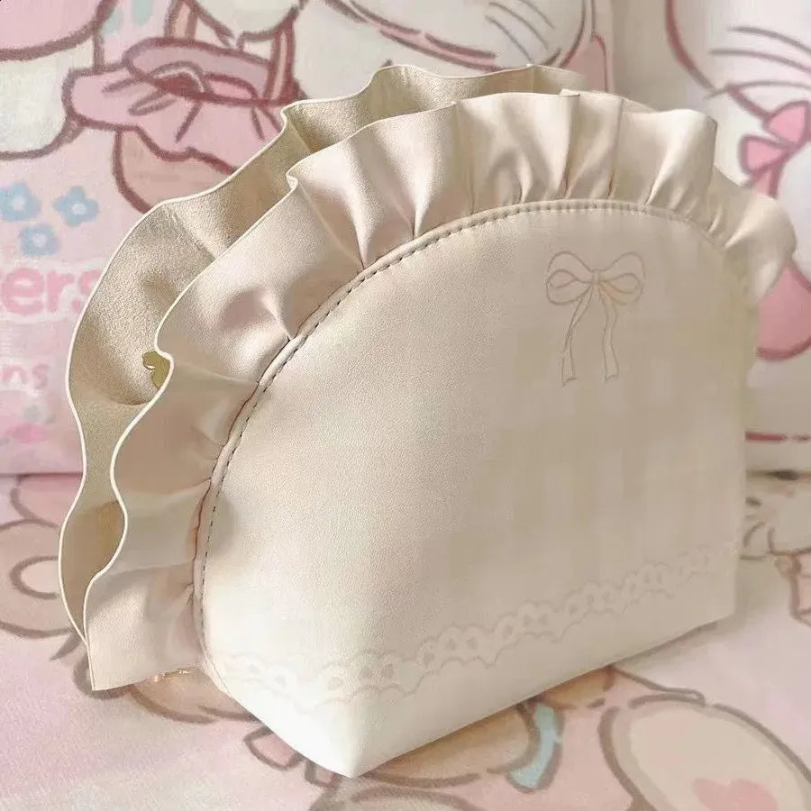 Open cosmetic bag showing interior compartments and storage capacity