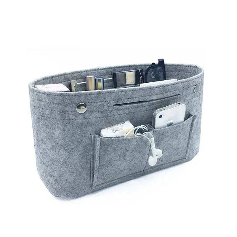 Felt cloth cosmetic organizer with multiple interior pockets open