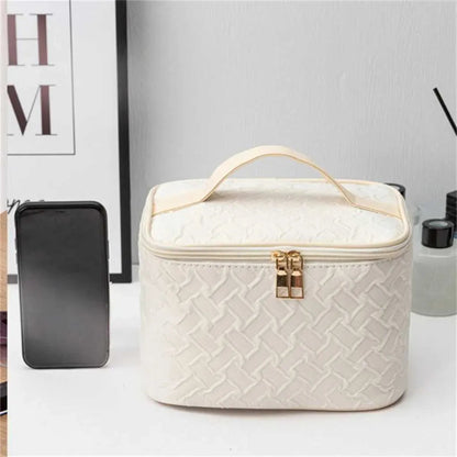 Front view of white square travel makeup bag with zipper closure