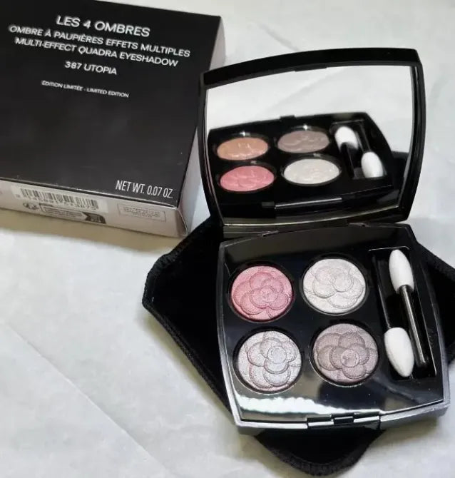 Close-up view of eyeshadow palette with four complementary colors