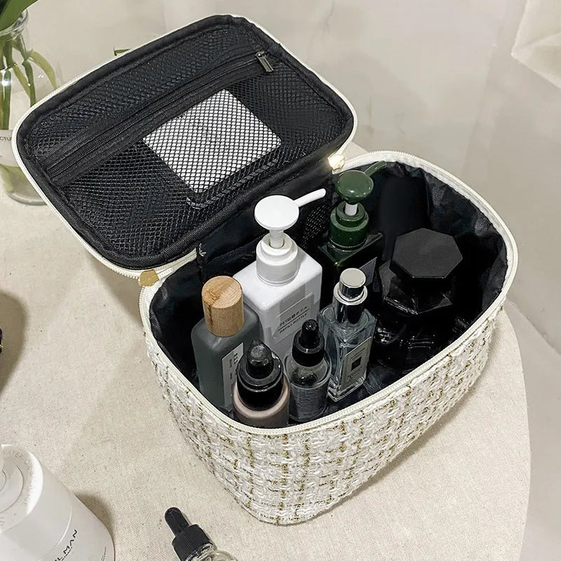 Waterproof cosmetic organizer pouch with zipper closure