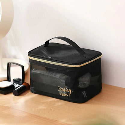 Mesh cosmetic bag set with heart pattern displayed open