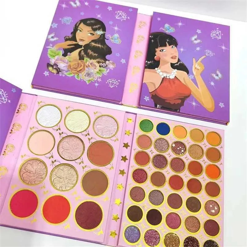 Open 117-color eyeshadow palette showing four pages of makeup pigments