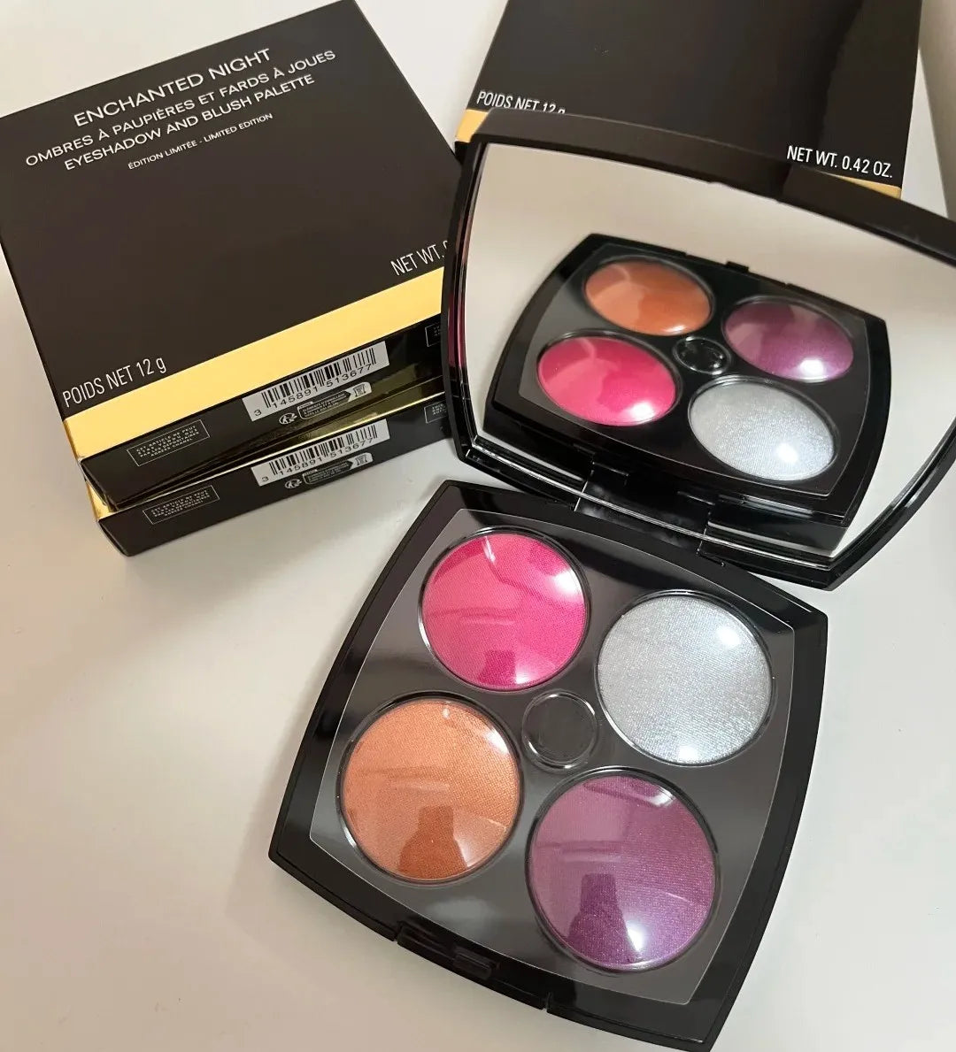 Eye shadow and blush palette with pearl light finish open on a flat surface