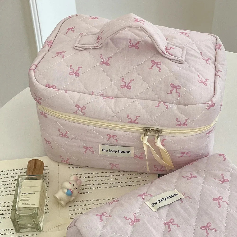 Cosmetic bag displayed next to personal care items for scale
