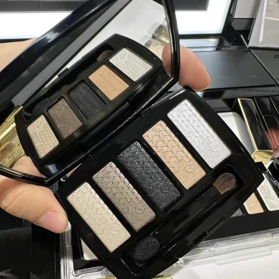 Limited edition eyeshadow palette with five pressed powder shades displayed open