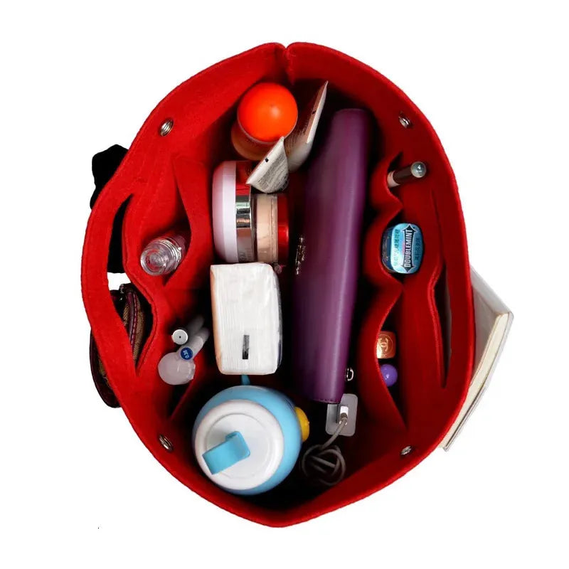 Makeup and toiletry items organized in felt storage insert