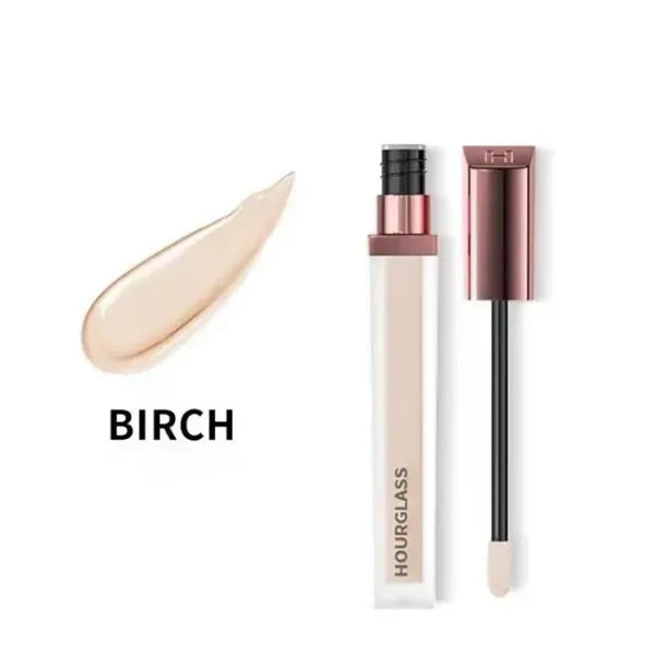 Cream concealer product in a small container with applicator