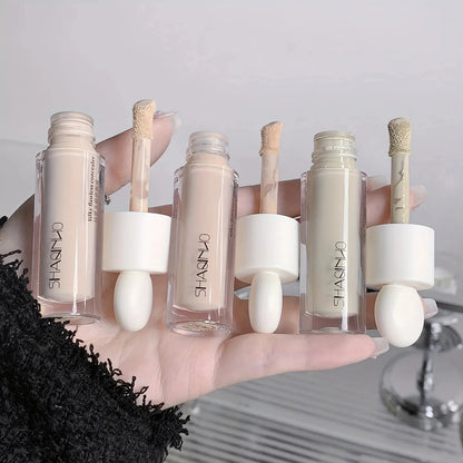 Close-up of concealer being applied to skin to demonstrate coverage