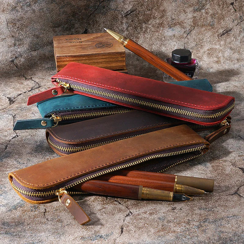 Pencil bag open showing interior space for storing pens and stylus