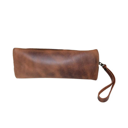 Open view displaying the interior space of the leather coin pouch