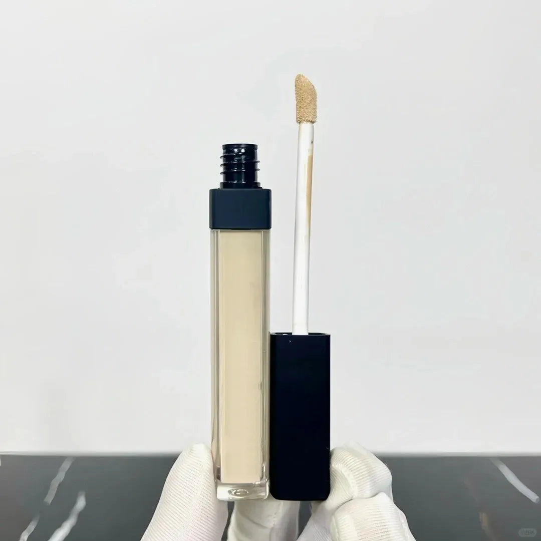 Creamy liquid concealer in a small tube with doe-foot applicator