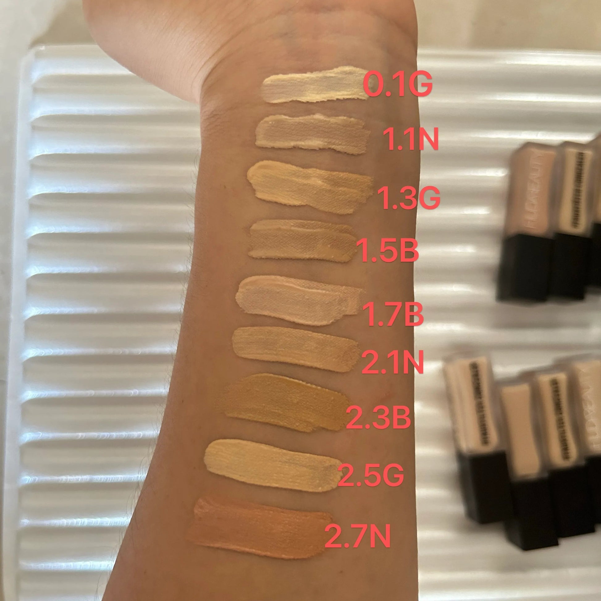 Close-up view of concealer being applied to under-eye area