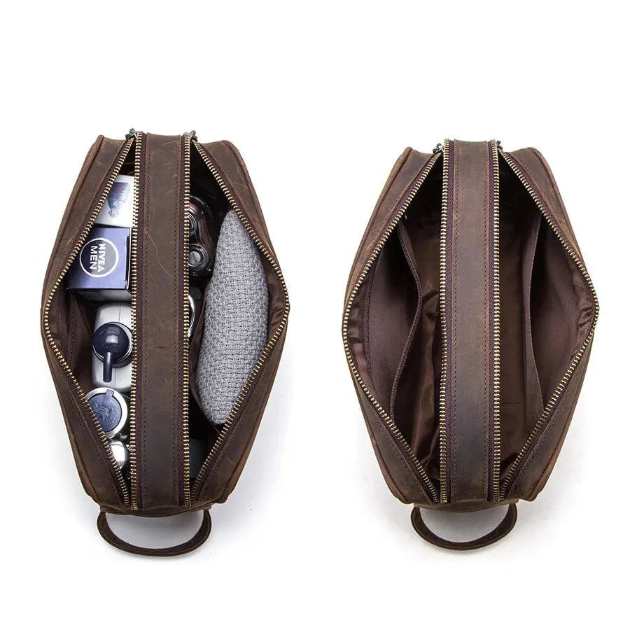 Interior view of leather toiletry bag showing multiple compartments for organization