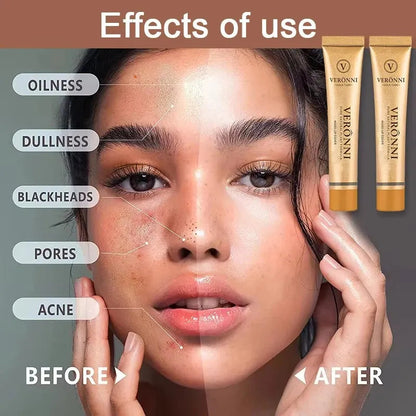 Close-up of concealer being blended on hand with makeup brush