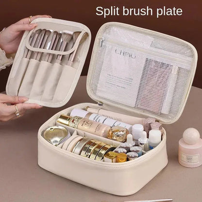 Compact cosmetic tote shown in a neutral color with organized interior compartments