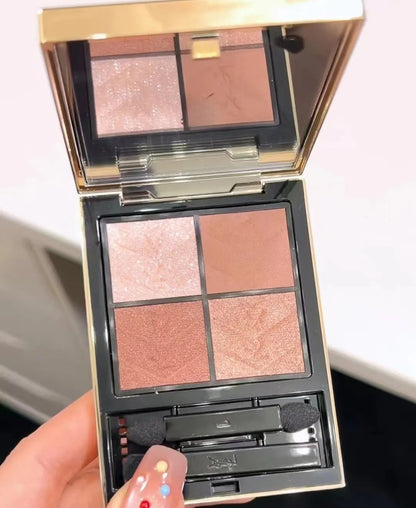 Close-up view of eyeshadow palette showing matte and shimmer textures