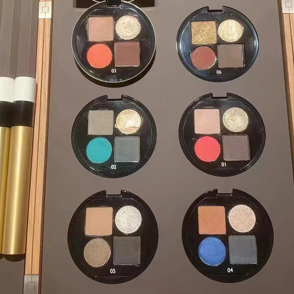 Four-color eyeshadow palette with glitter and matte finishes in earth tones