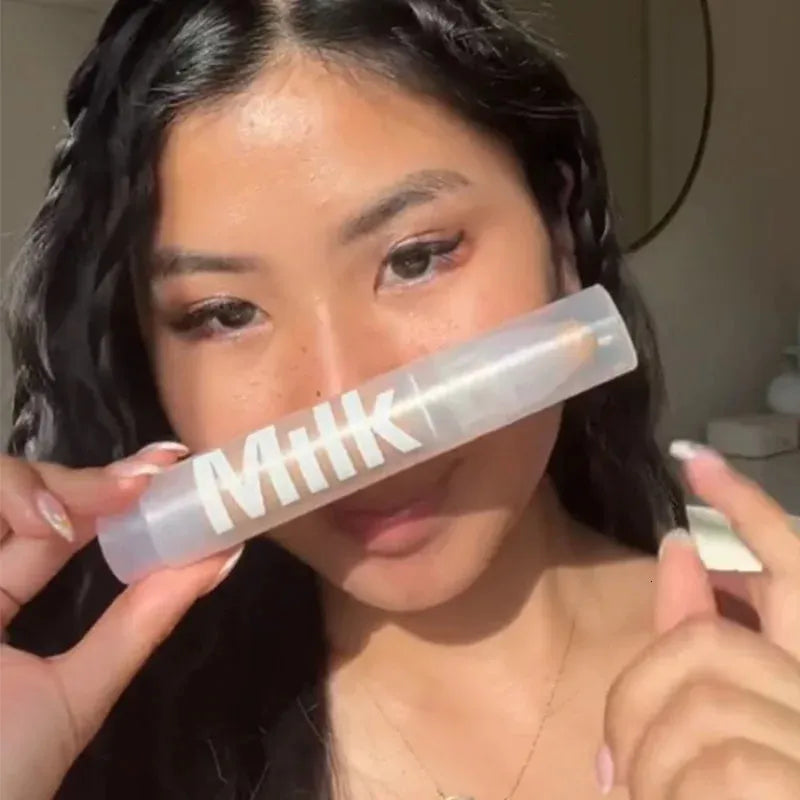 Makeup product displayed alongside application tools
