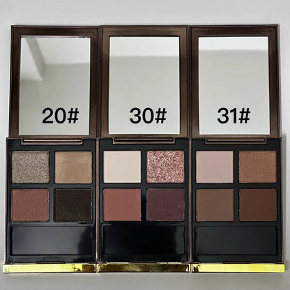 Four earth-tone eyeshadow shades in a compact palette