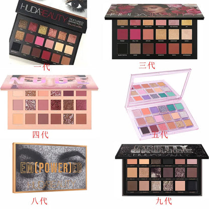 Close-up of eyeshadow palette with brush on side