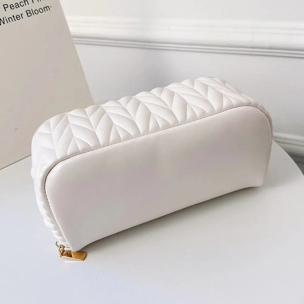 Front view of a PU cosmetic organizer bag with zipper closed