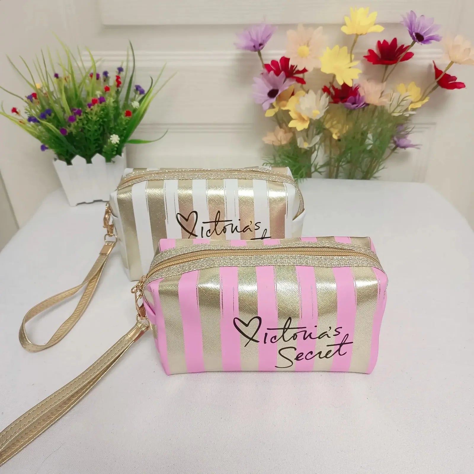 Side view of handheld cosmetic bag demonstrating compact size