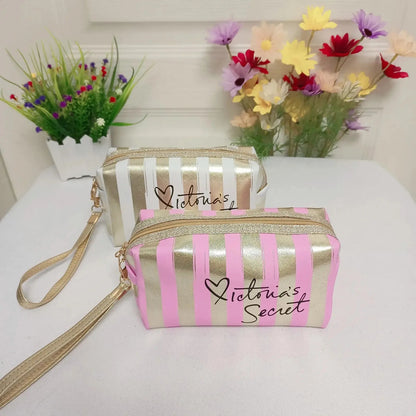 Side view of handheld cosmetic bag demonstrating compact size