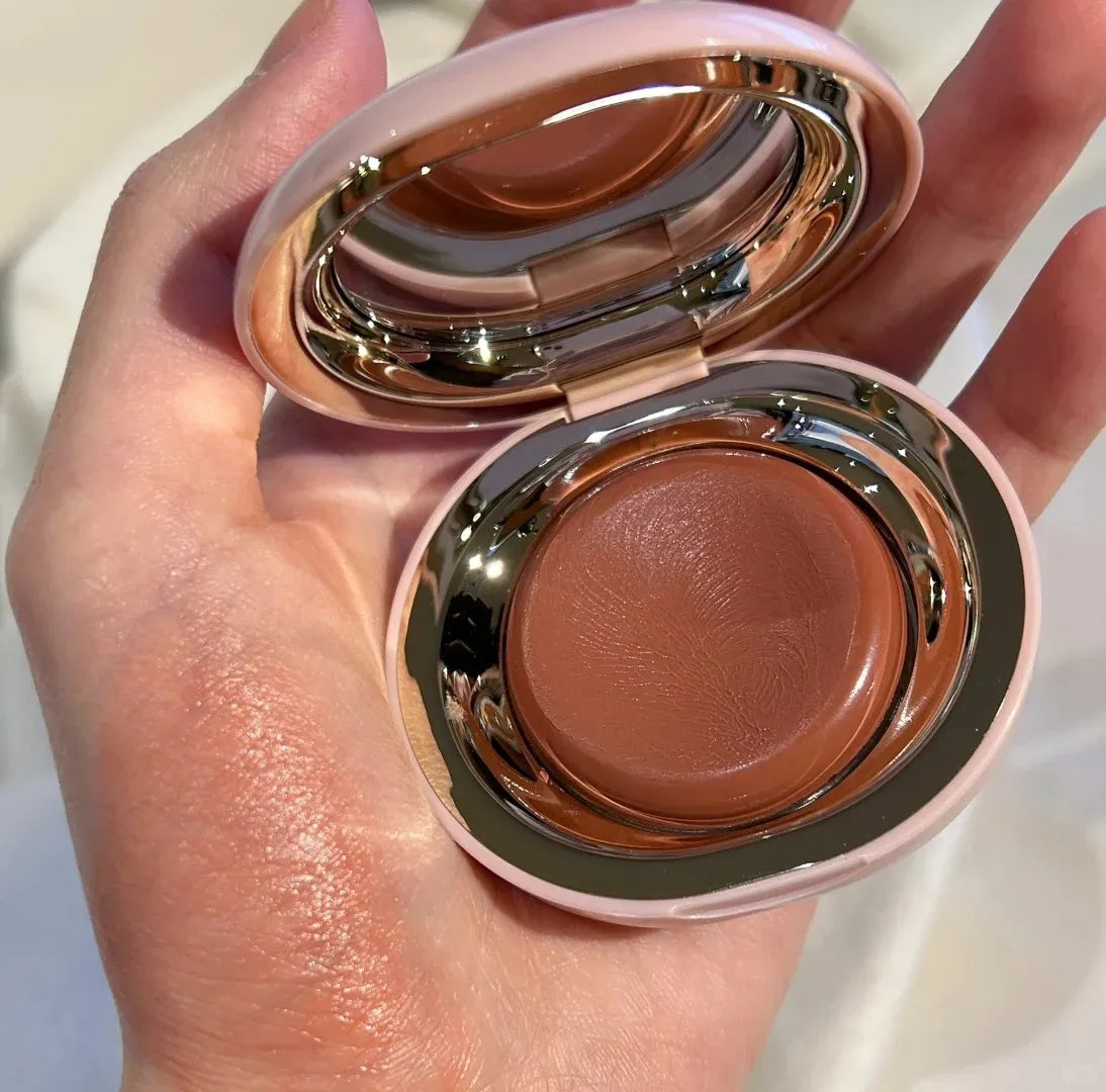 Glossy lip and cheek blusher compact in mauve apricot berry tones