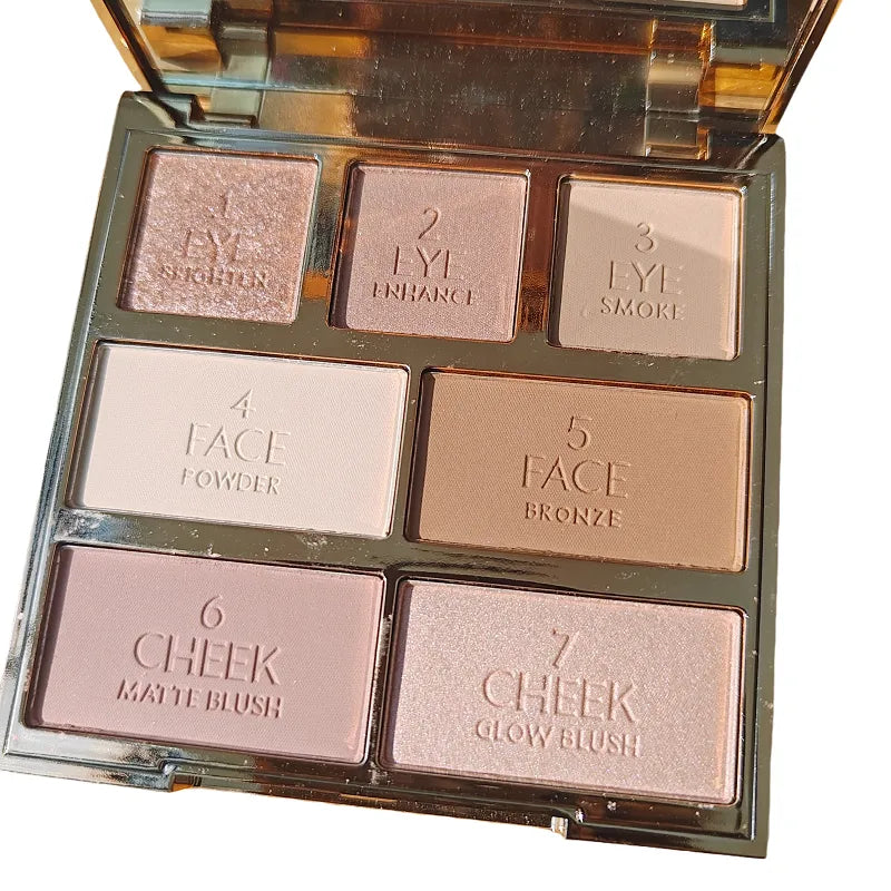 Open makeup palette showing eyeshadow and face makeup products
