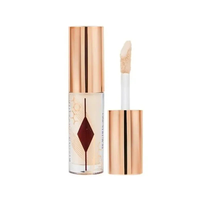 Liquid concealer sample tubes arranged on a neutral background