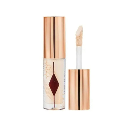 Liquid concealer sample tubes arranged on a neutral background